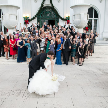 flagler-museum-wedding-35_group-shot_kiss_front-of-museum